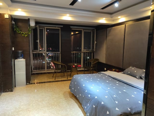 济宁万达广场soho豪华大床房落地观景窗 - jining shi的公寓 出租