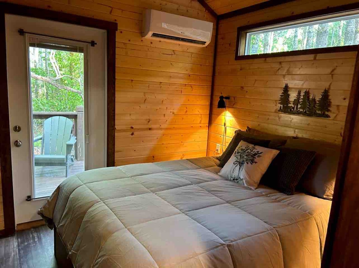 Get away, unwind and Snuggle Inn the Pines.