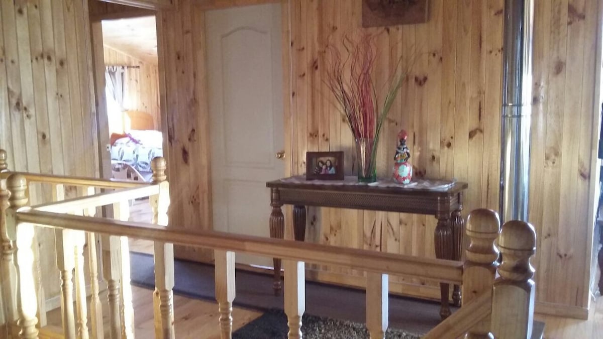 Tradicional casa de madera sureña con desayuno