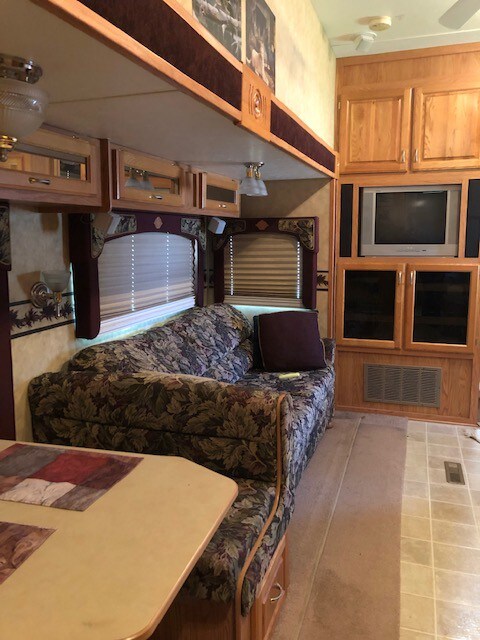 Comfortable Camper 34'  Will Move to Your Site!