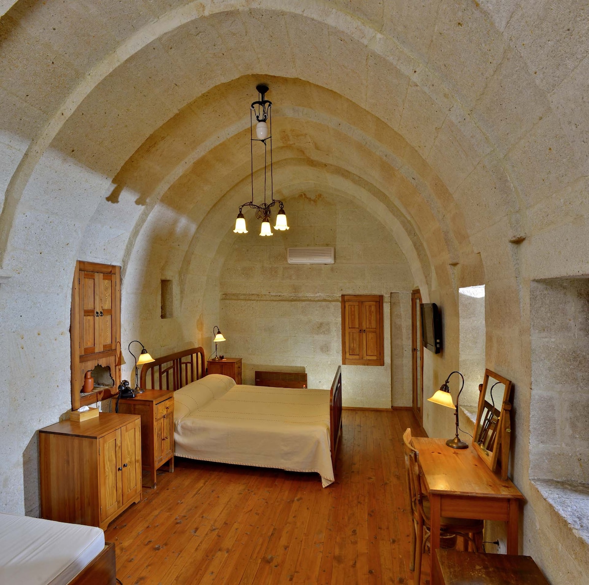 Hillside Stone Arch House with Terrace