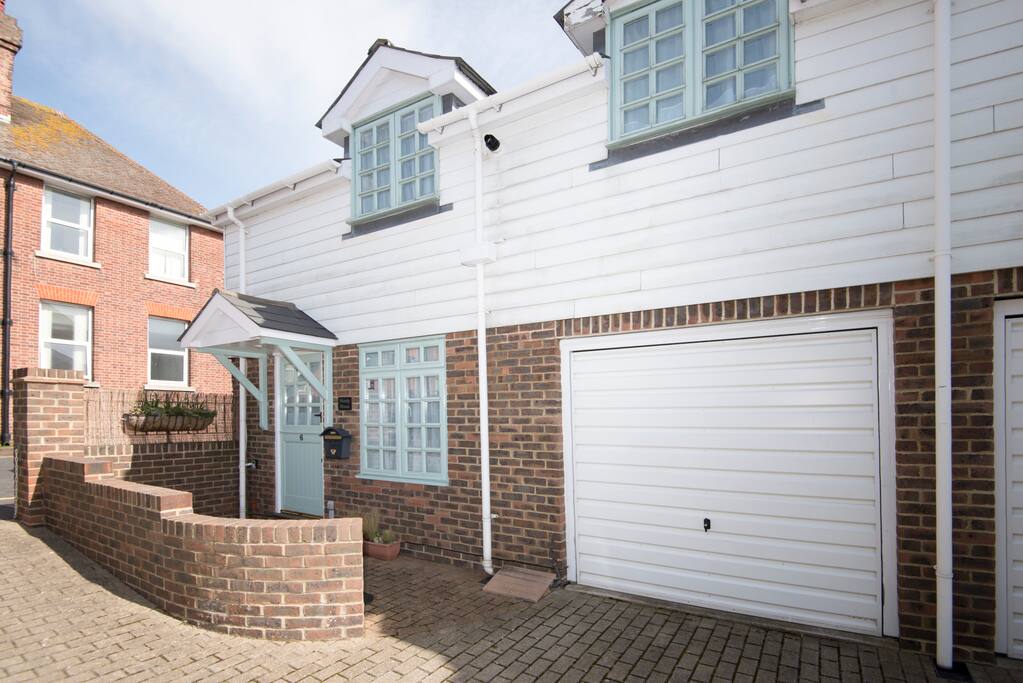 wendy house with integral private garage