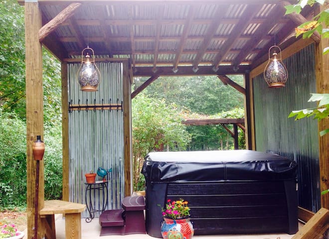 rustic artistic charm with hot tub