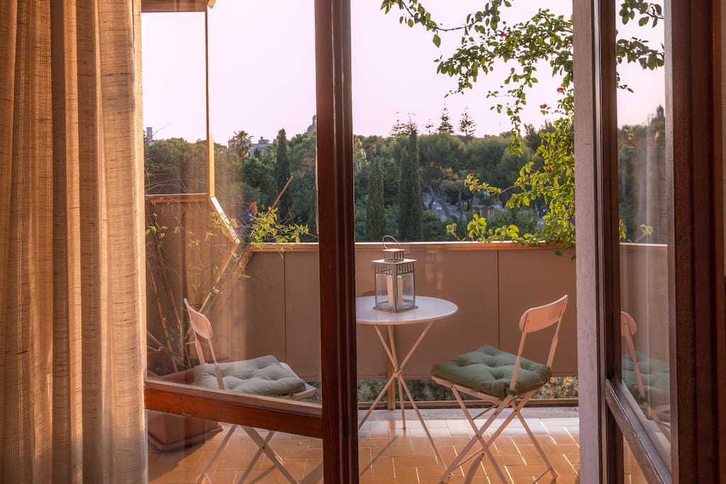 old room with balcony garden view