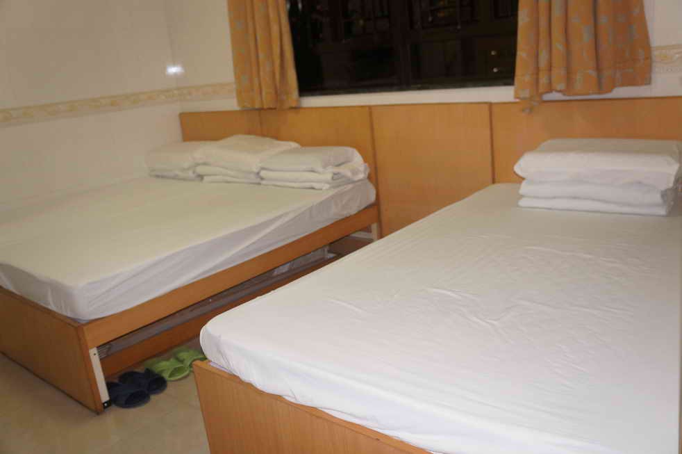 Rm07 - 一張單人床和一張雙人床房