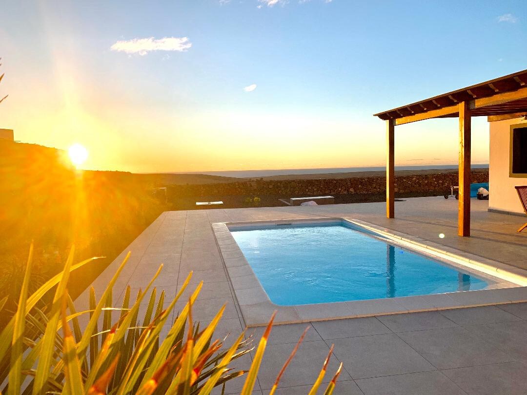 Relax in Stylish Villa with Heated Pool, and Views