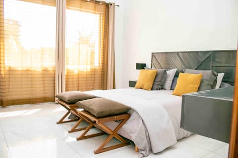 Appartement rénové à 2 min de Kin Plaza Rotana