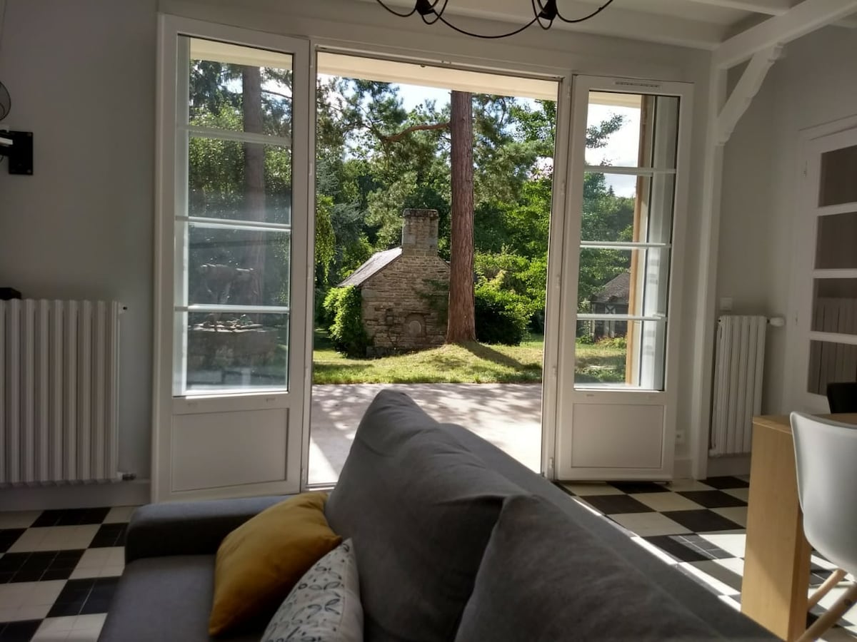 2 maisons dans un parc arboré au bord de l'Orne