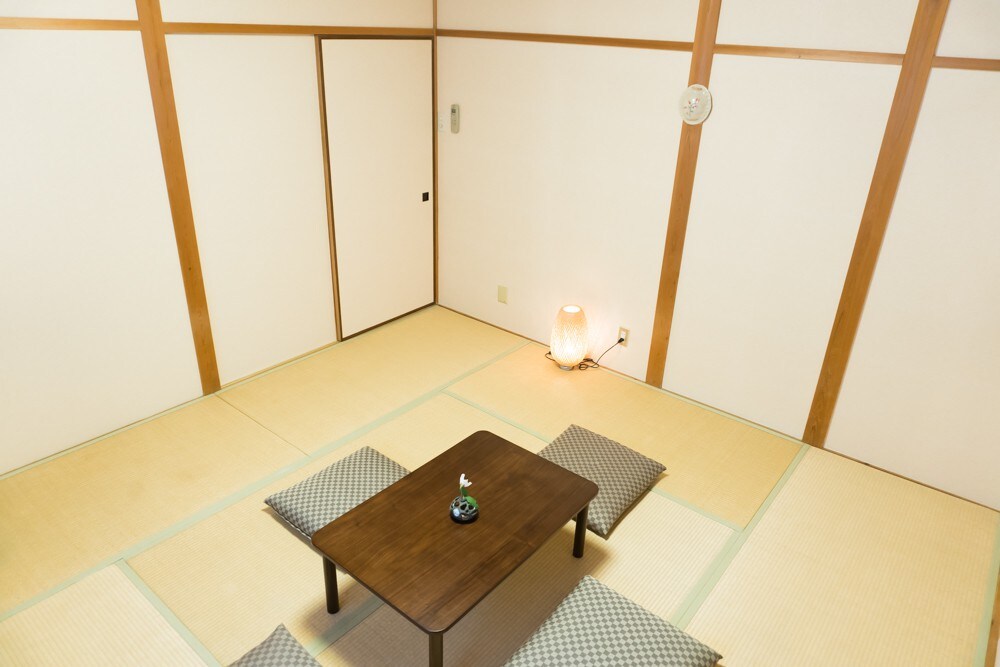 Hidden tatami room near forest and lake.