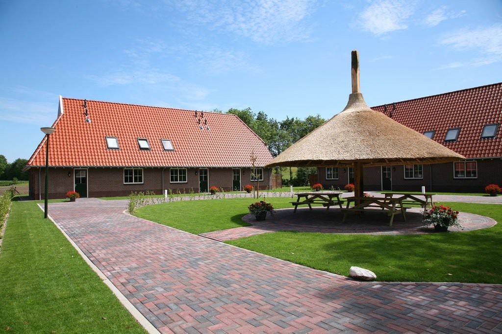 Boerderijhuis met uitzicht op landerijen