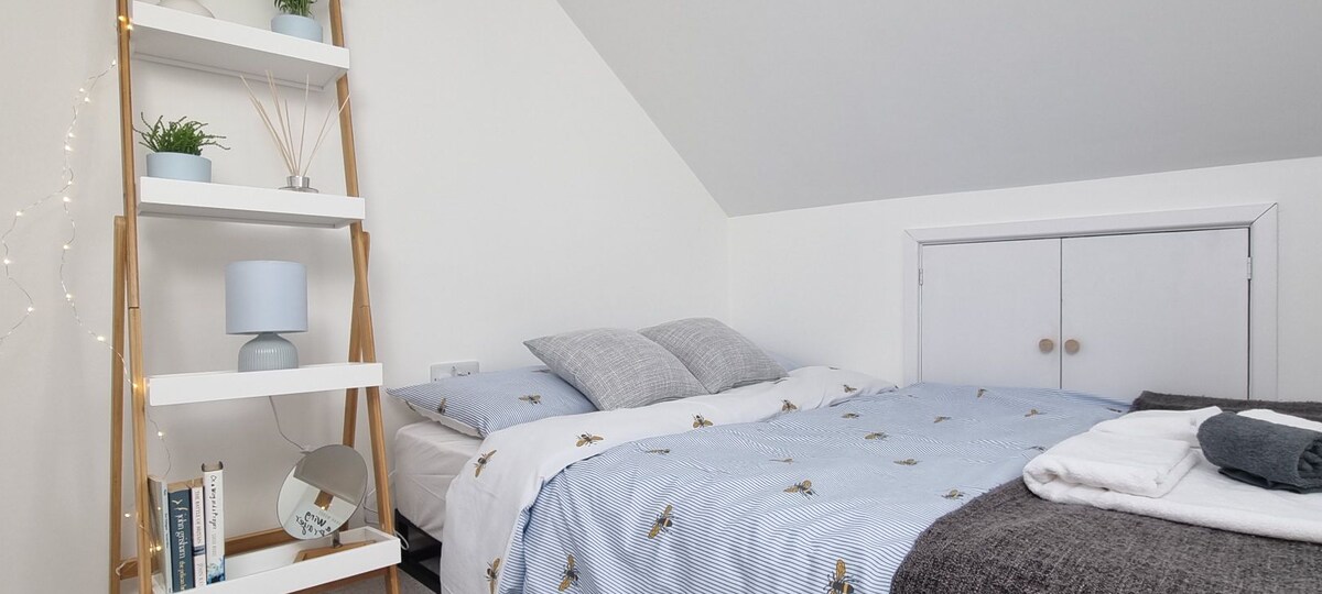 Cosy attic room 'in the clouds'