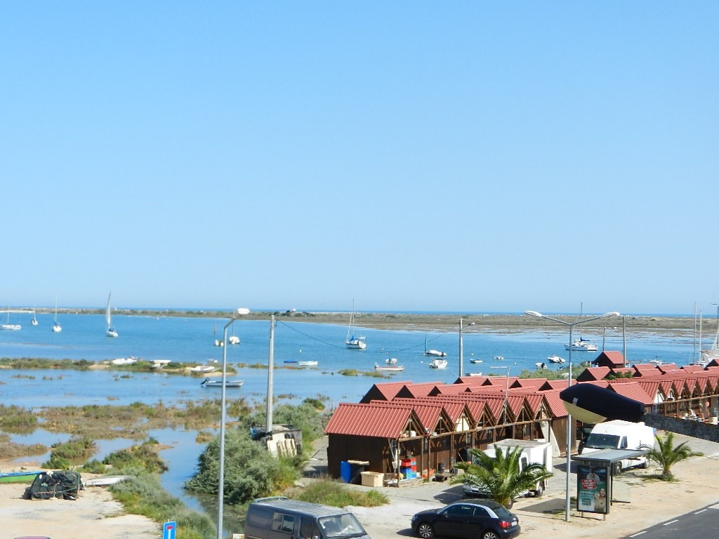 Appart et toit terrasse, vue sur Port, Mer, Lagune