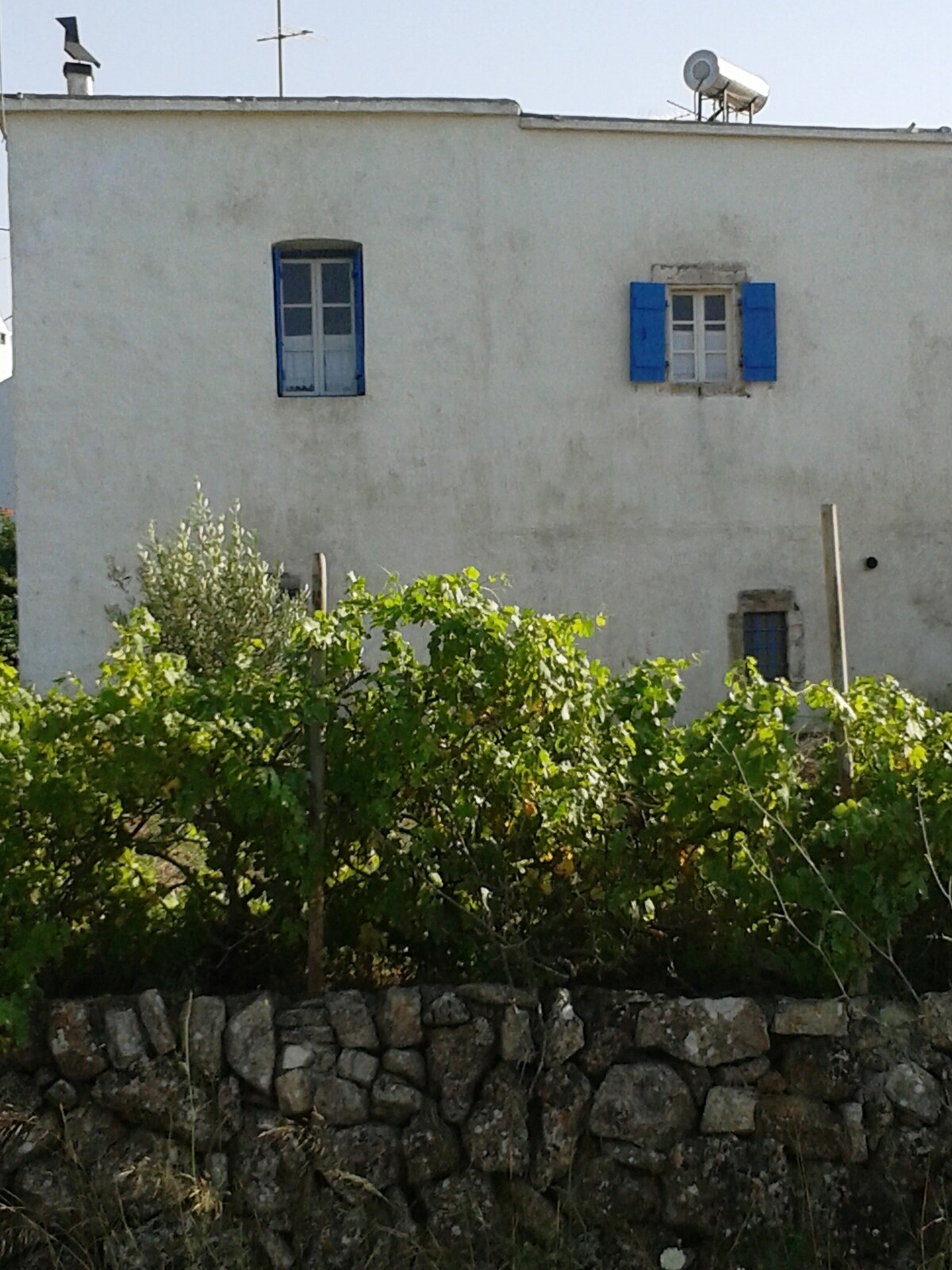 Traditional home built of stone with vaulted area.