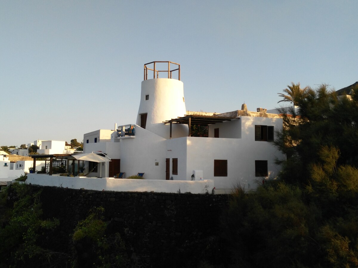 Ancient Windmill on the sea