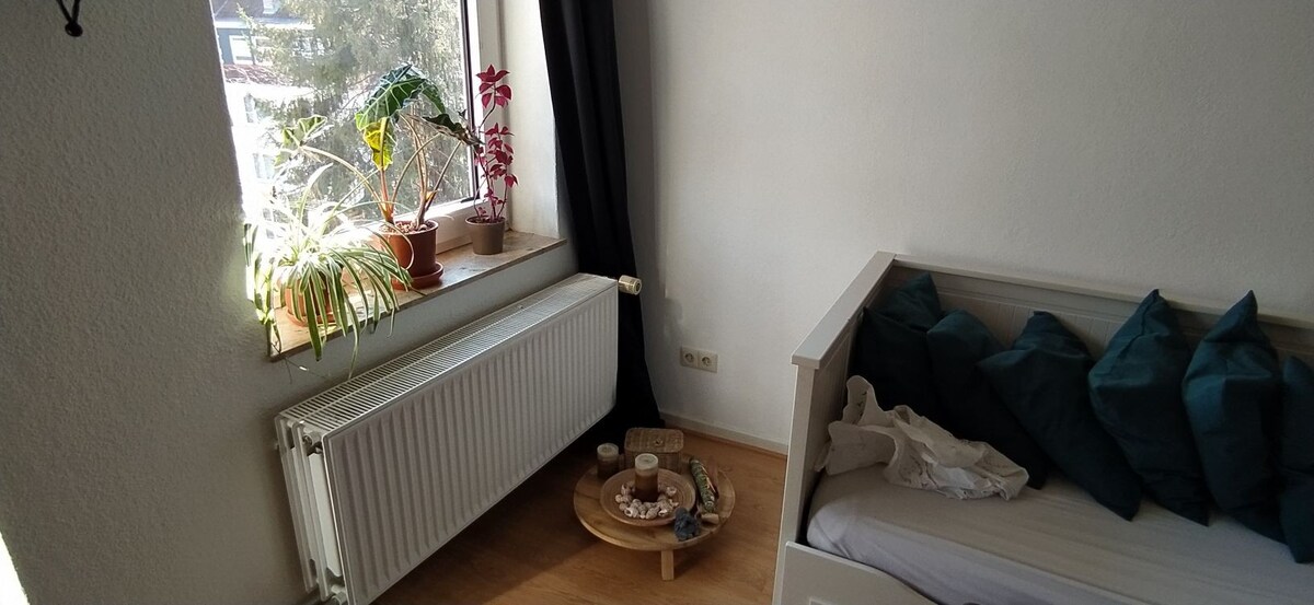 Light bedroom with balcony in center of Hildesheim