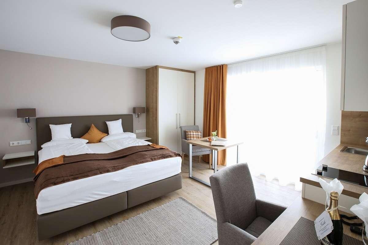 App. Hotel Fidelio (Bad Füssing), Einzimmer-Suiten Typ 4 mit Balkon und ebenerdiger Dusche