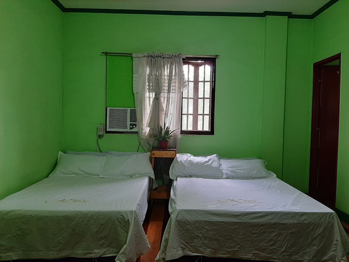 Delightful green bedroom