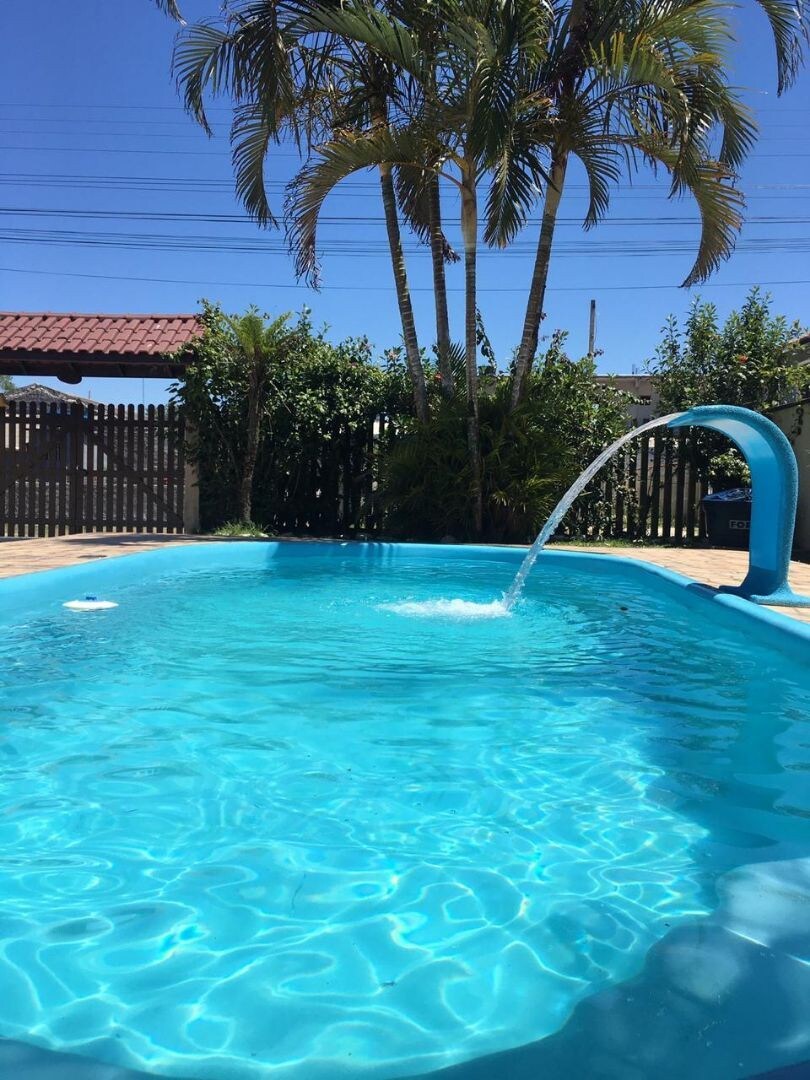 Casa com piscina amplo quintal