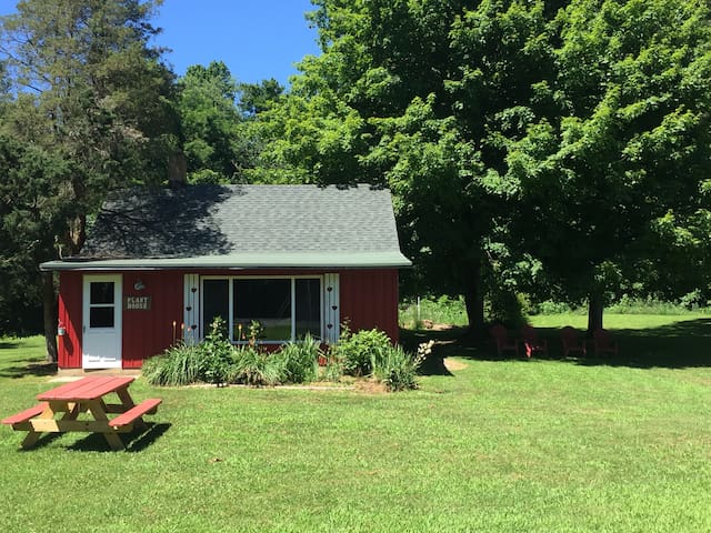 plant house with lake & trails