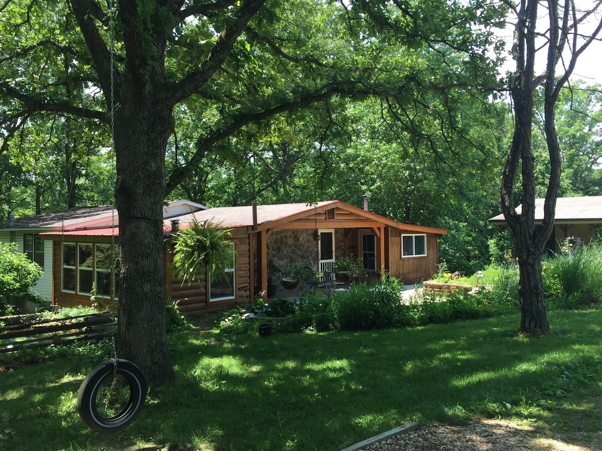 Koi cottage located in the woods with hot tub