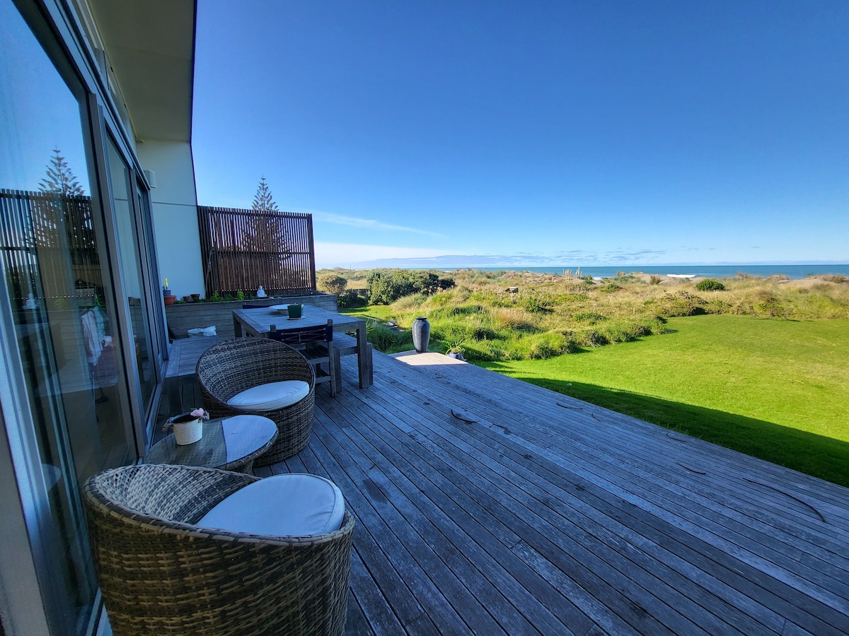 Designer house- Sun drenched absolute beach front