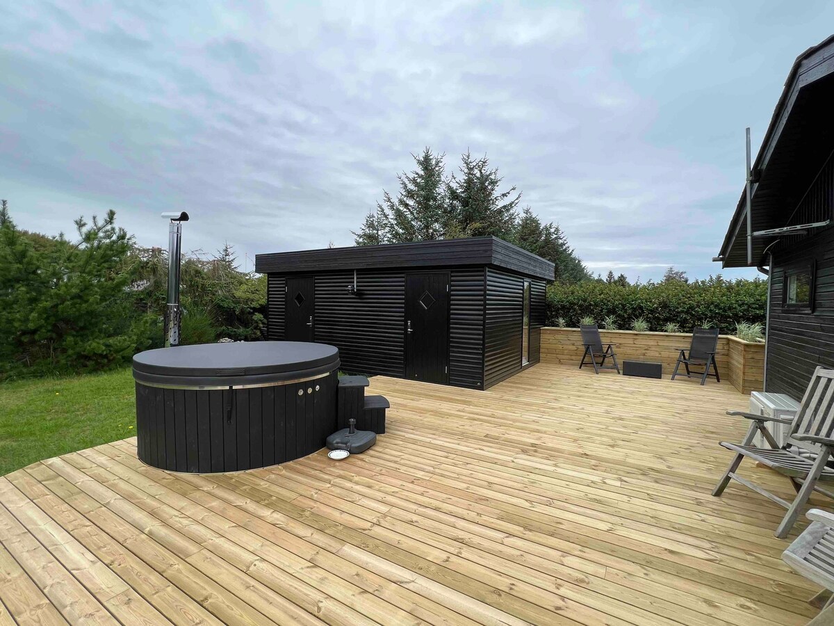 Sommerhus med vildmarksbad og børnevenlig strand