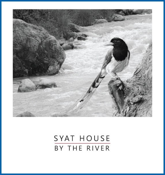 Syat House - By the River, with forested mountains