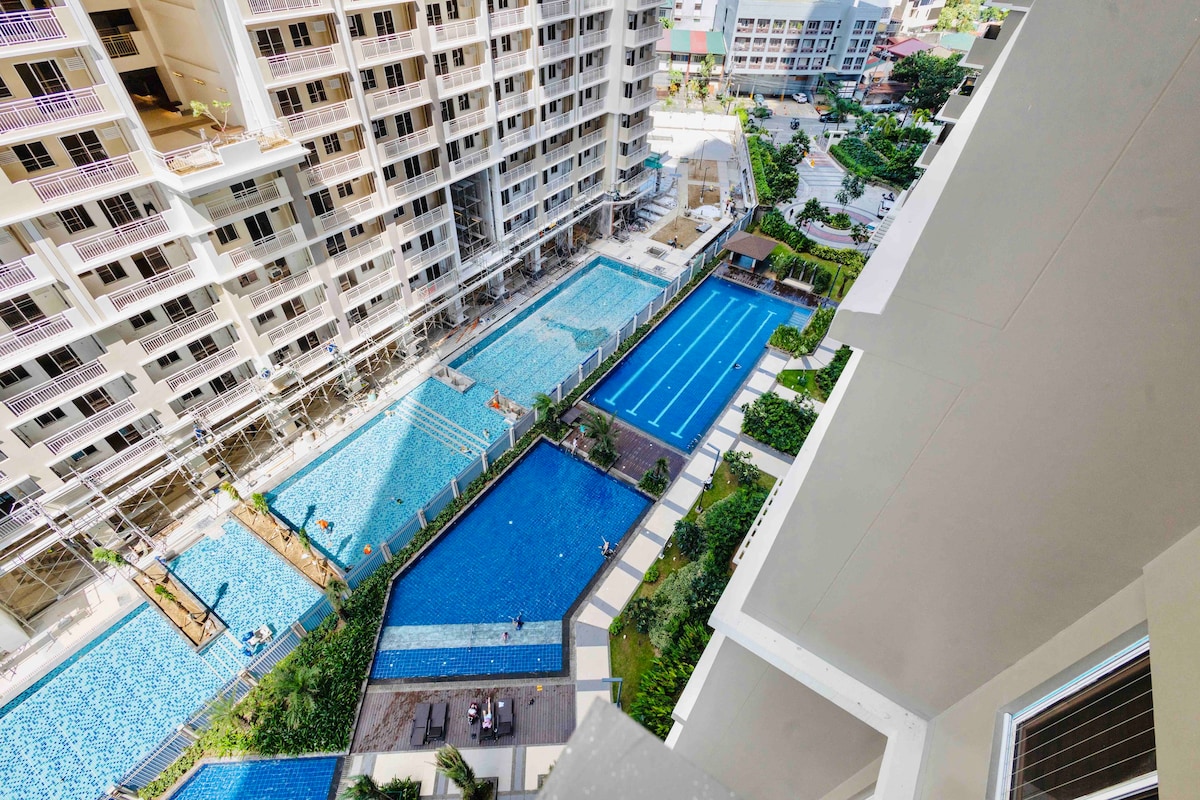 Hayati BGC Ortigas Netflix Fast Wifi Balcony Pool