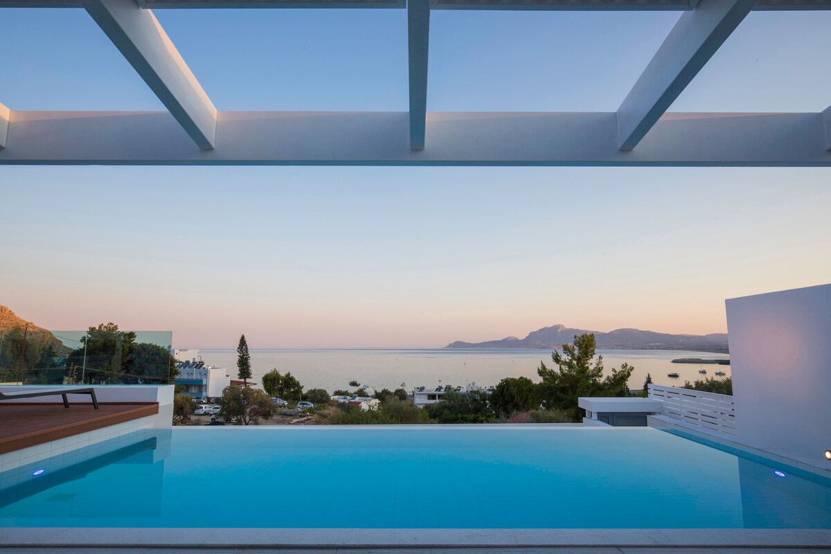 Stylish Sunrise White Villa with Infinity Pool