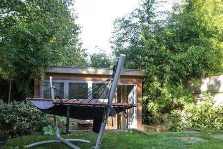 Sunny Studio with Garden and Patio.