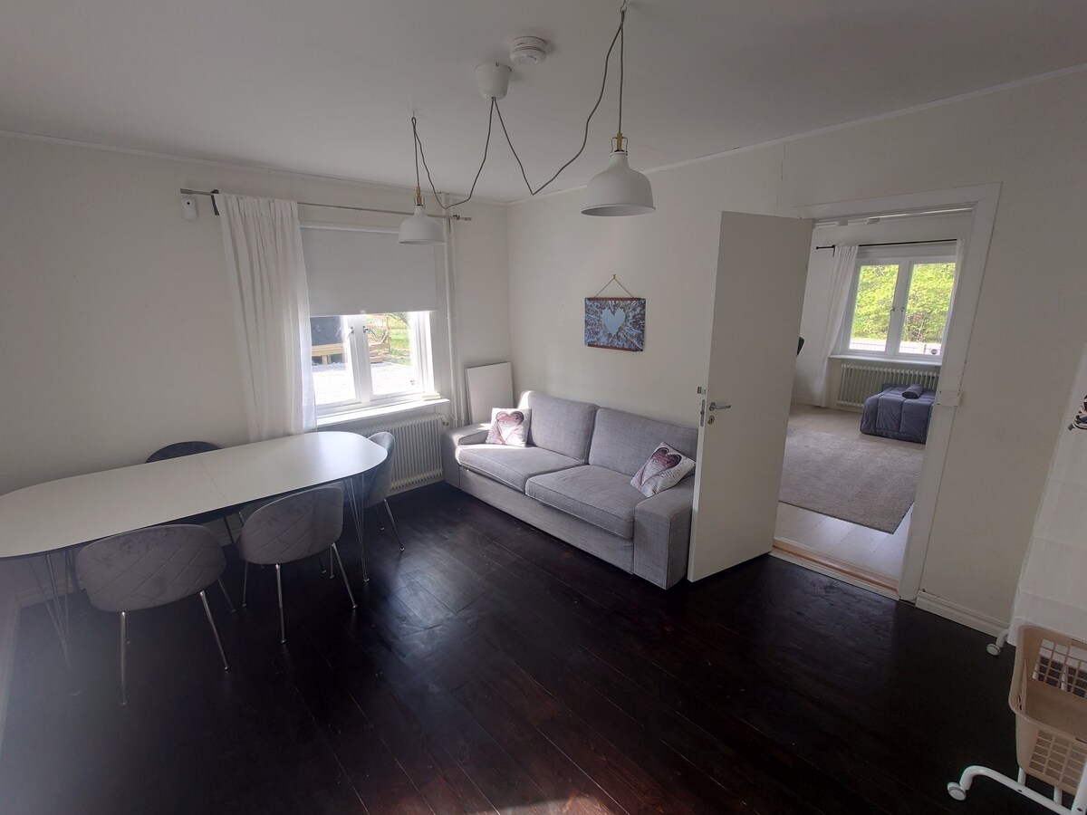 Apartment with shared kitchen in House