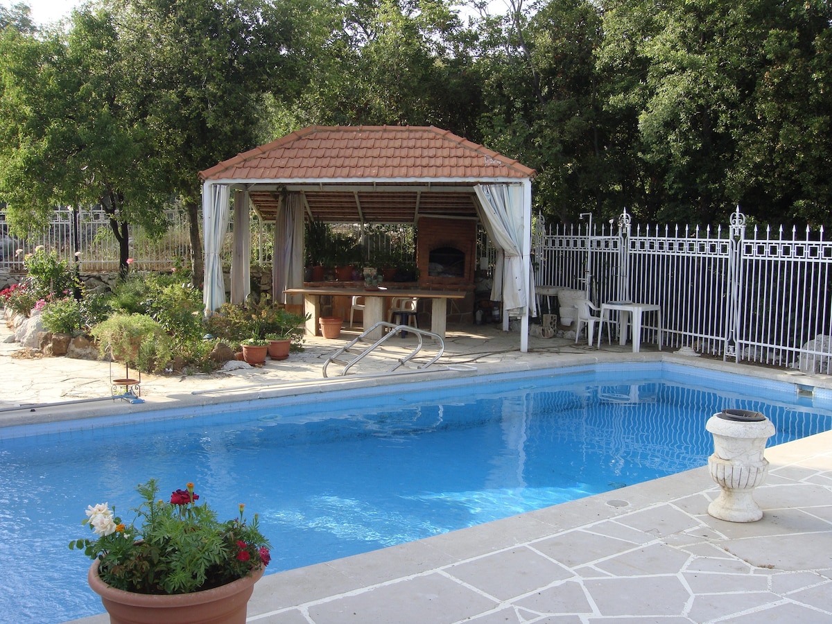 bAjaltoun 
a villa with a swimming pool