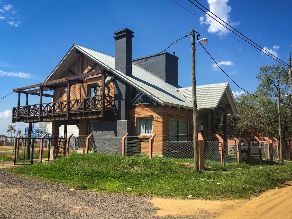 Casa sul la Ribera del Paraná