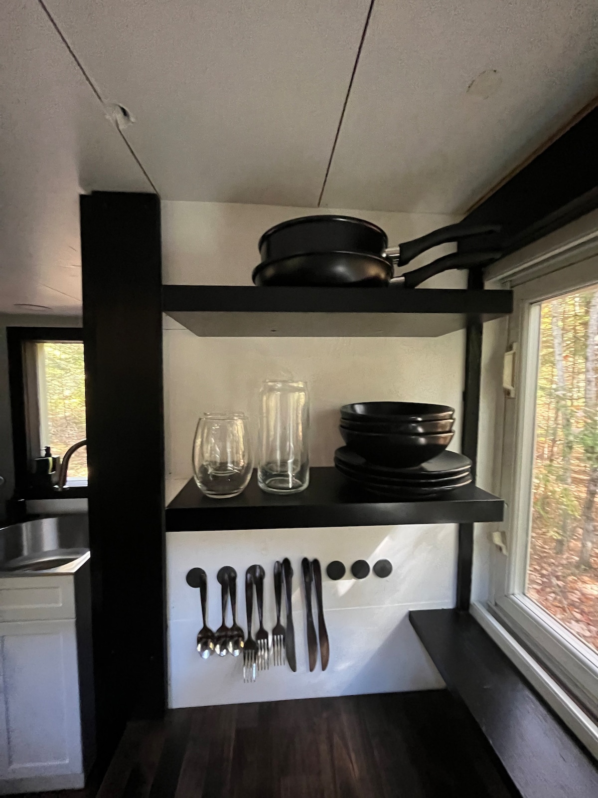 Tiny house glamping in woods of New Hampshire