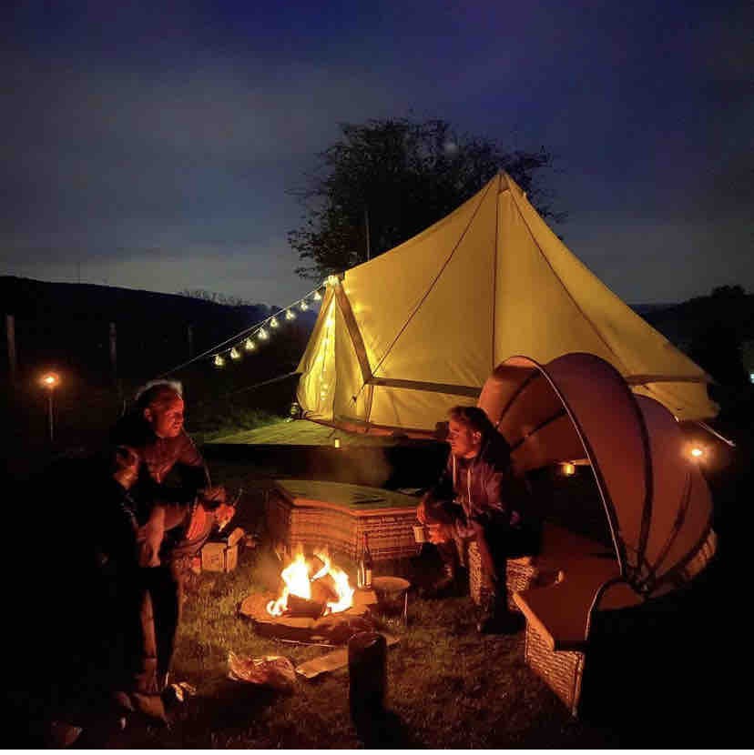 Luxury bell tent with hot tub