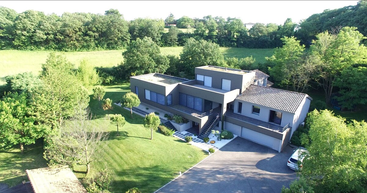 Upstairs bedroom in architect villa with view