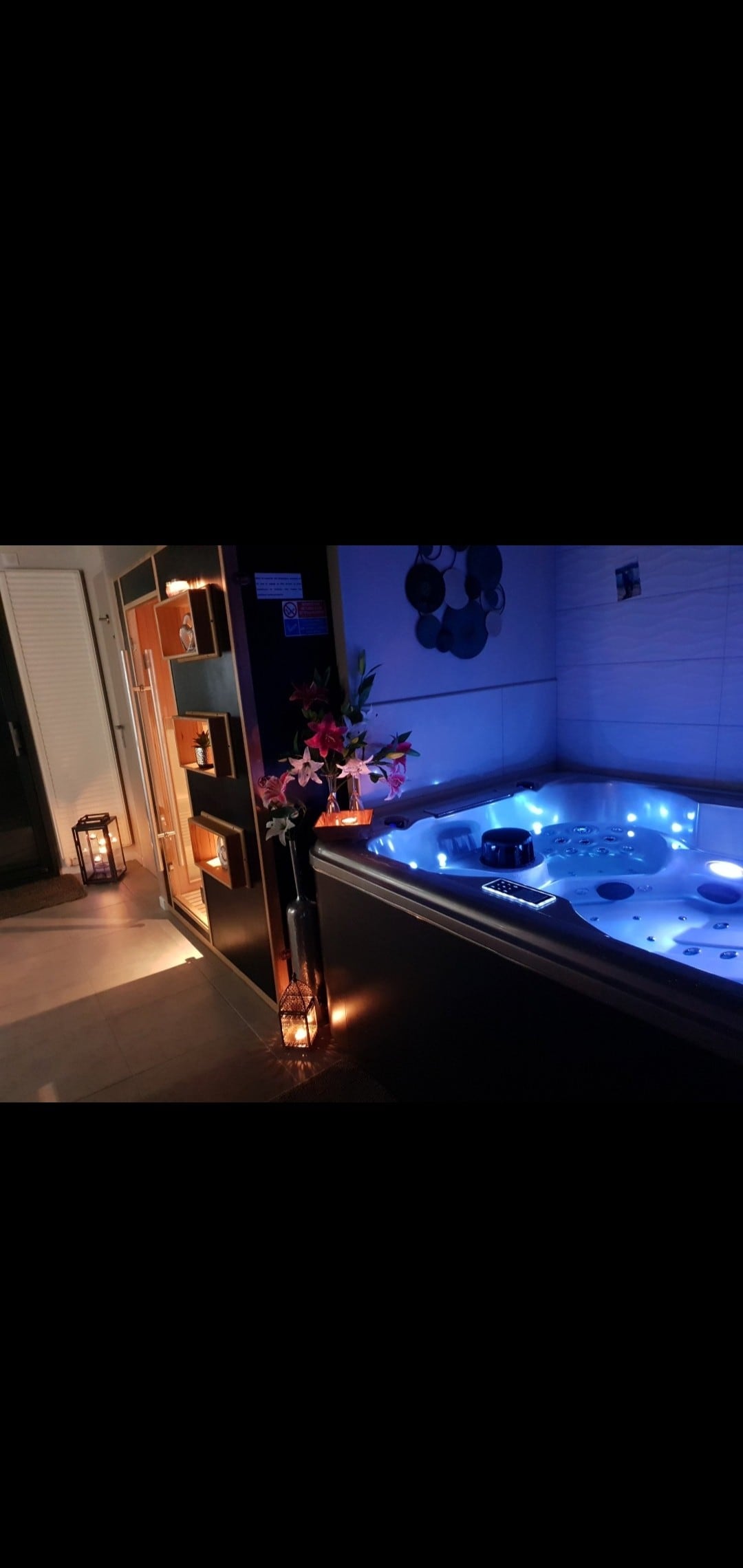 Suite avec Jacuzzi et Sauna privatif