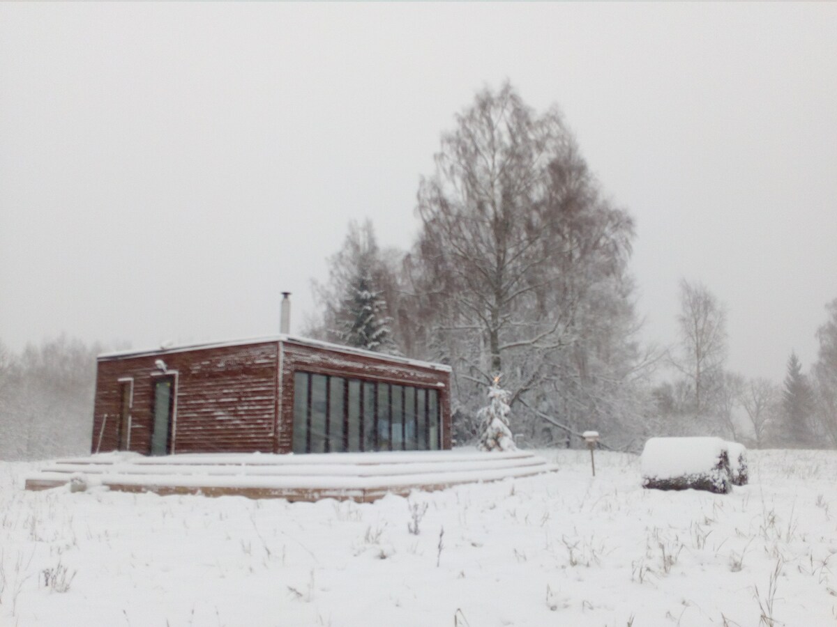 Cosy cabin on a wild meadow