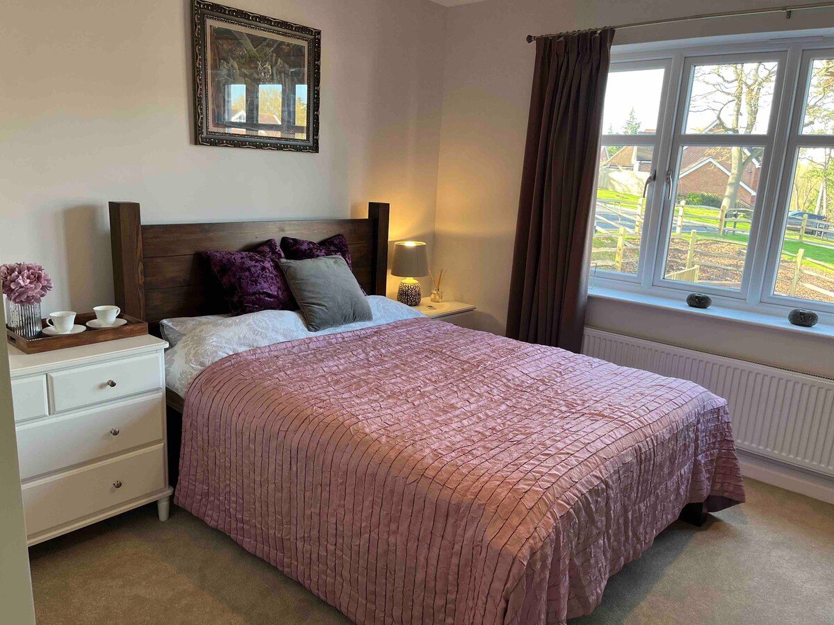 Private bedroom with ensuite in a beautiful home