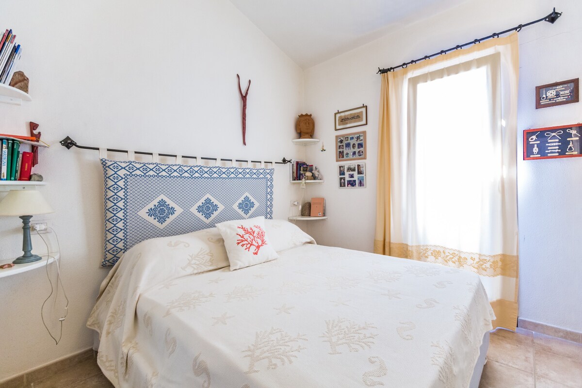 Cosy apartment with wonderful view in Capotesta