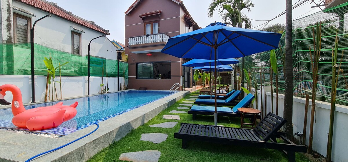 Cheerful room with balcony in beach villa