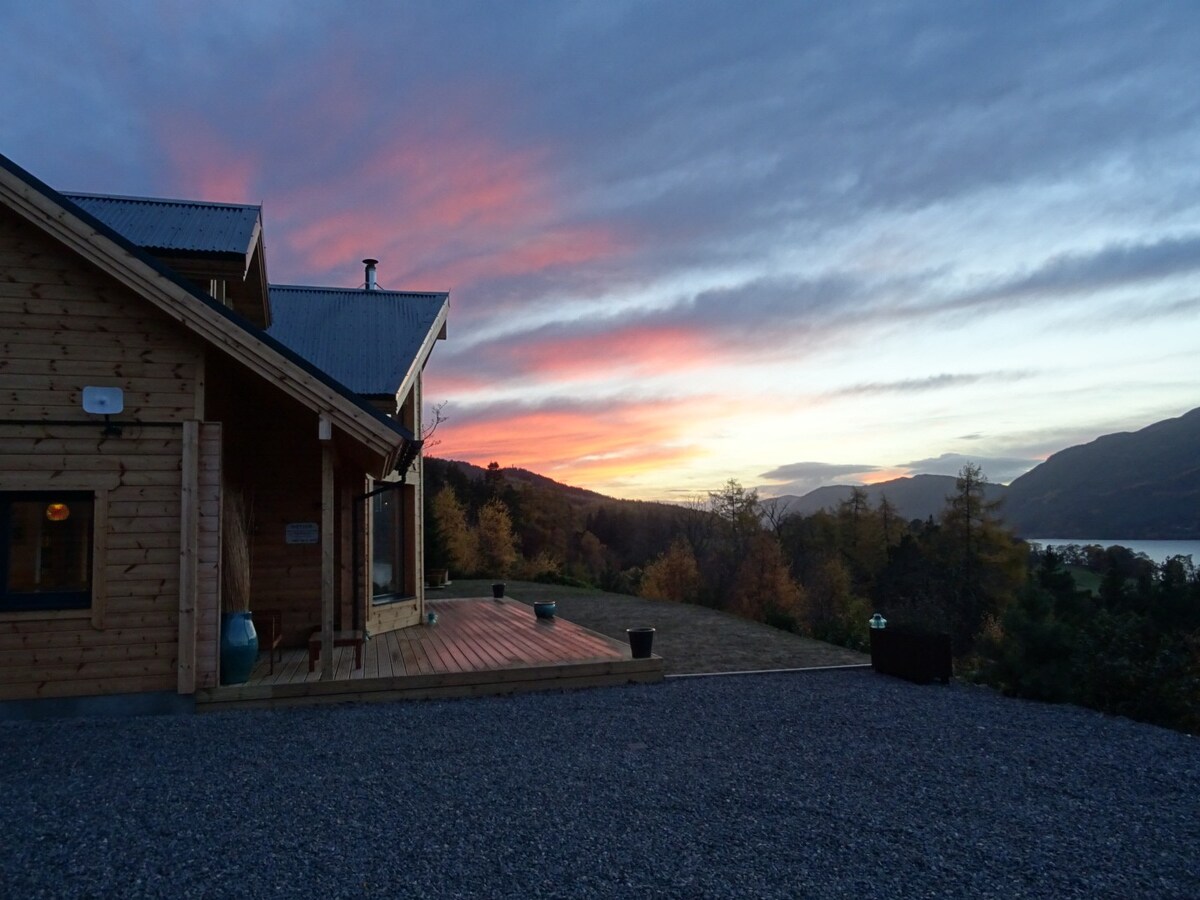 Luxury log house with stunning Loch Ness views.