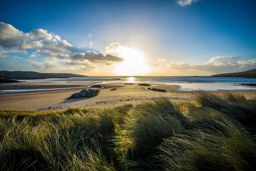 luxury thatched cottage with breathtaking views.
