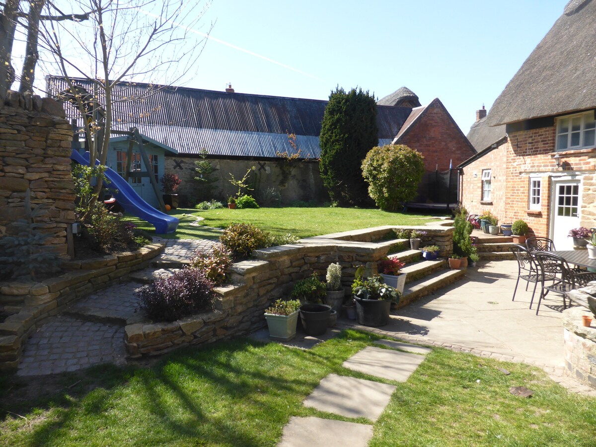 Large period thatched Cottage in charming village