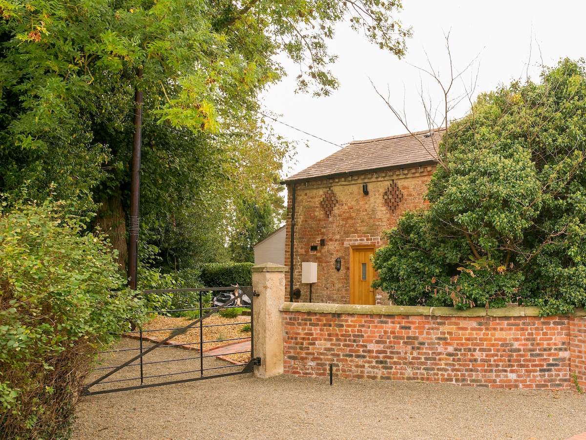 位于宁静村庄的美丽老教练别墅（ Old Coach House ）。