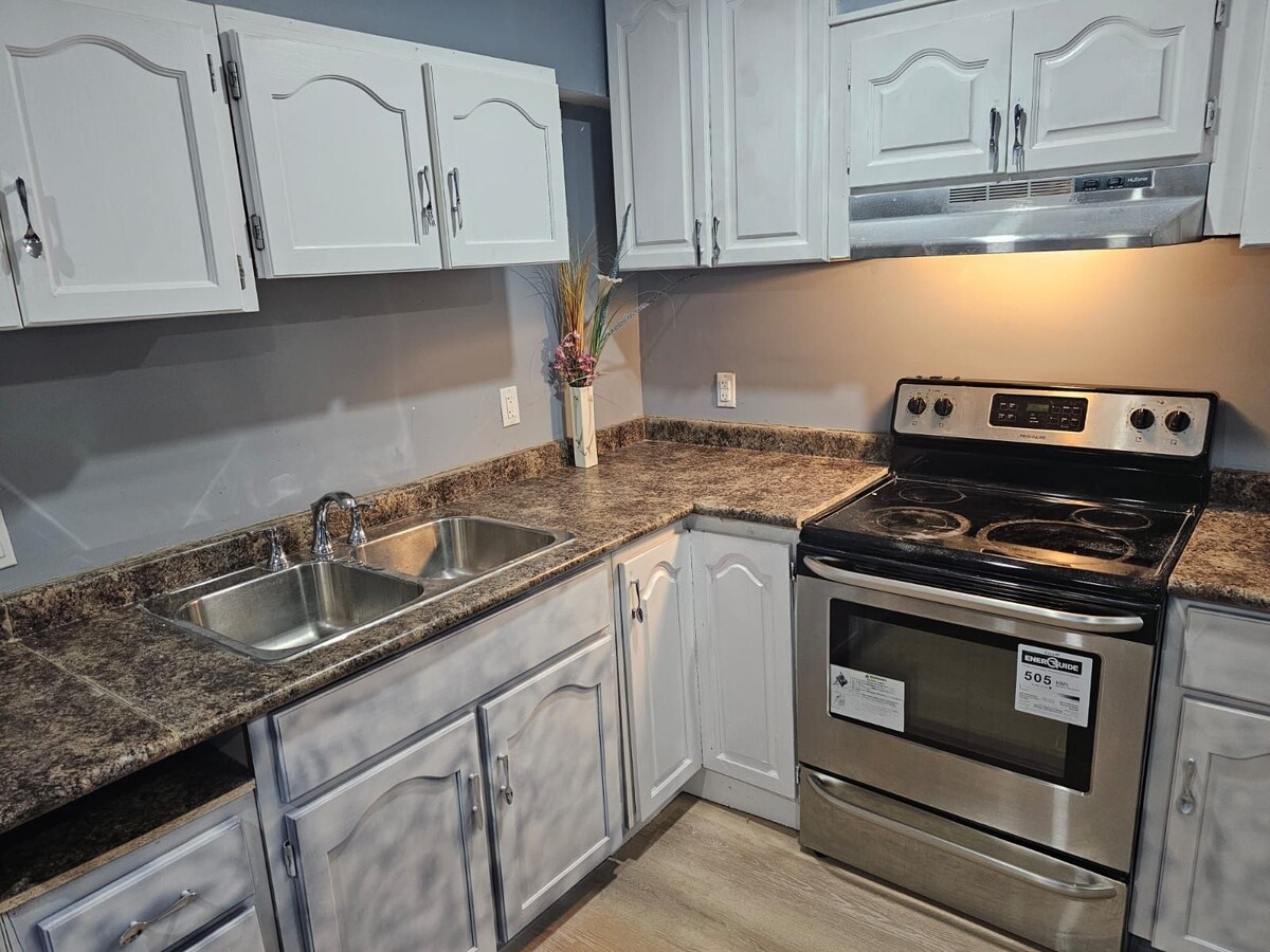 Bedroom & Living room with a cute kitchenette