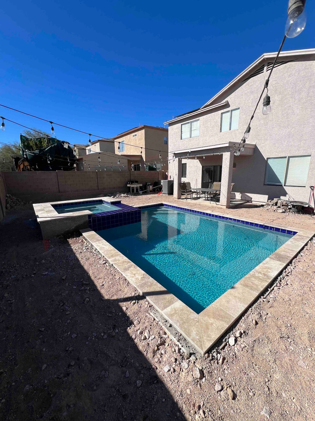 Two story house with pool and jacuzzi by mountain