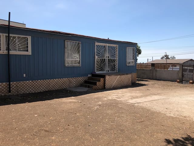 blue house (mobile home)