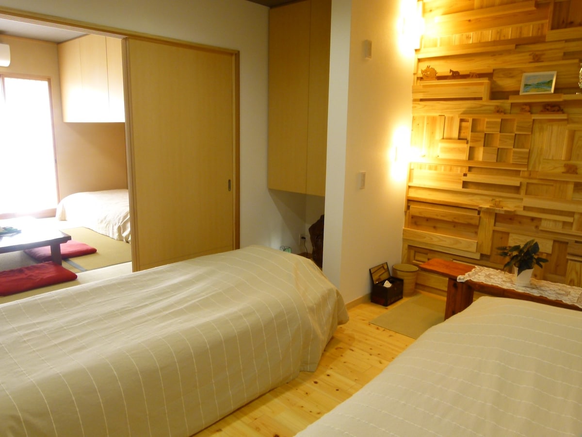 [日式客房]舒适宽敞的日式客房，海榻米垫上有一张床