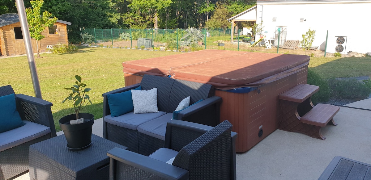 Maison chaleureuse avec Jaccuzi.